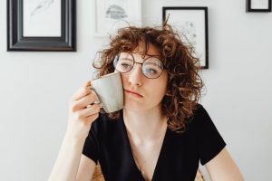 A woman is considering pregnancy options: abortion or adoption